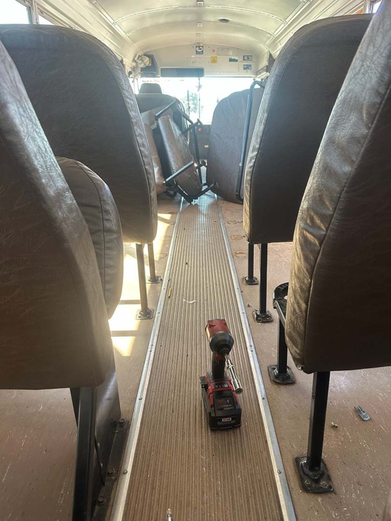 Removing school bus seats